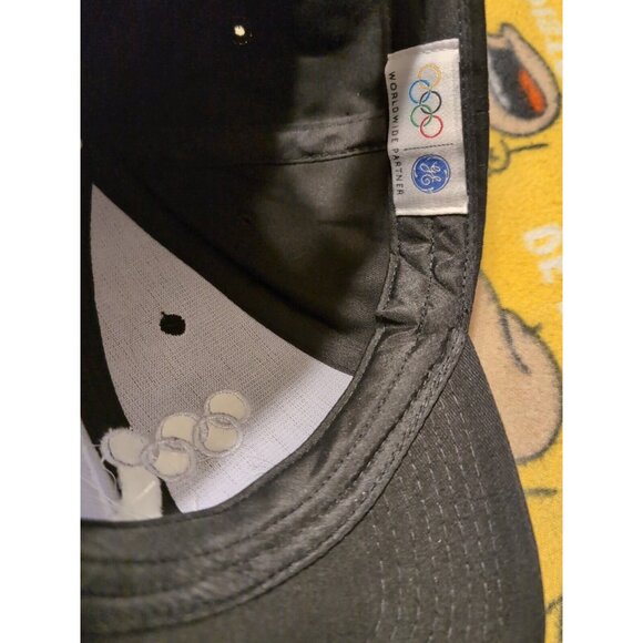 GE Olympic World Wide Partner Adjustable Black Strapback Hat - Picture 6 of 7